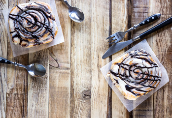Cinnamon rolls or cinnabons with cream sauce
