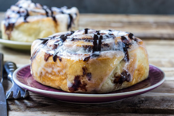 Cinnamon rolls or cinnabons with cream sauce