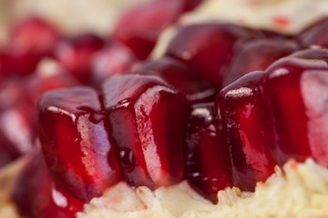Close up of fresh organic pomegranate seeds, fruit