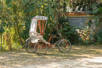 Fototapeta na wymiar trishaw, parking place near the temple, Lumbini Nepal