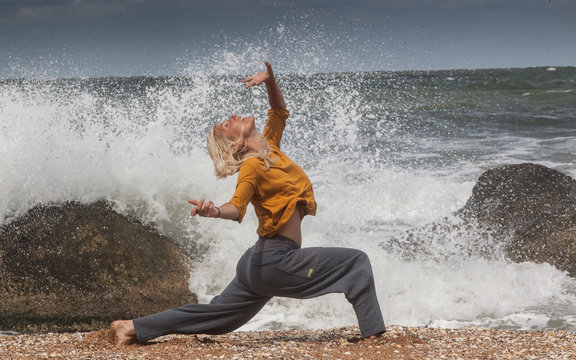 dancer on coast. waves, water