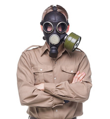 Man in gas mask with arms crossed