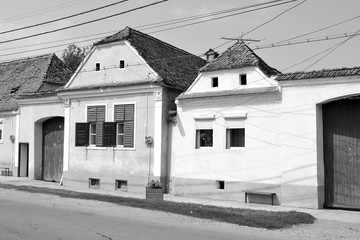 Typical rural landscape and peasant houses in  the village Cata, Transylvania, Romania. The...