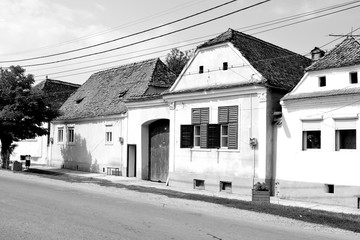Typical rural landscape and peasant houses in  the village Cata, Transylvania, Romania. The...