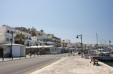 Fototapeta premium Street in the port with a view of the Naxos town at Naxos island in Greece