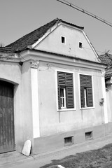 Typical rural landscape and peasant houses in  the village Cata, Transylvania, Romania. The...
