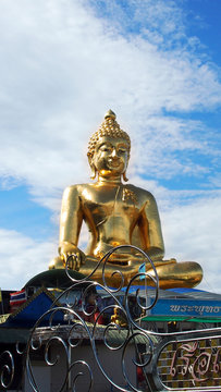 golden buddha statue in front of sky, Thailand