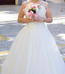 Fototapeta na wymiar Bride with wedding bouquet