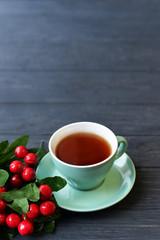 cup of tea hot drink warming in a green glass