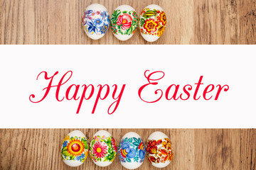 Lettering Happy Easter and decorated Easter eggs