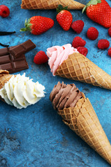 Vanilla frozen yogurt or soft ice cream in waffle cone.