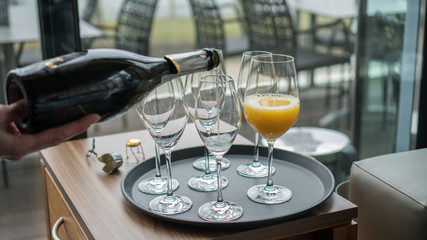 Glasses with champagne on the party table