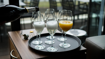 Glasses with champagne on the party table