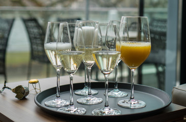Glasses with champagne on the party table