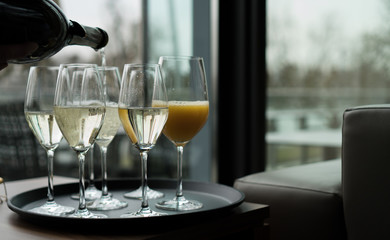 Glasses with champagne on the party table