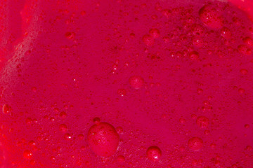 an abstract red paint texture whith bubble