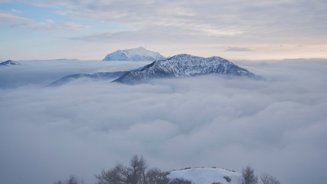 Clouds on  Mount Grigna and Lake Como from mount Legnoncino, Introzzo, Valvarrone, Lecco province, Lombardy, Italy, Europe.