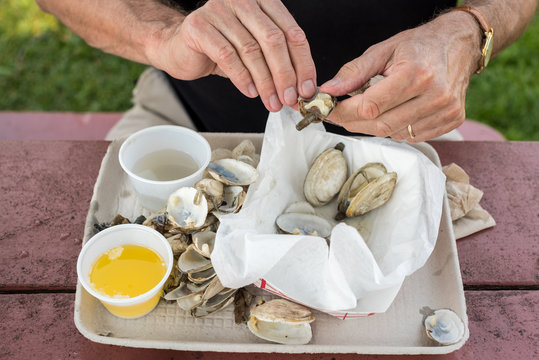 Man Eating Steamer Clams