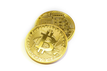 two crypto currency phisical gold bitcoin isolated on white background