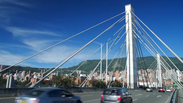 VIEW OF CITY BRIDGE GILBERTO ECHEVERRI - MODERN URBAN TRANSPORTATION ARQUITECTURE IN MEDELLIN COLOMBIA