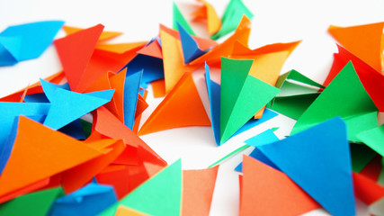 the multi-colored leaflets which are cut out from paper, colourful background, collage