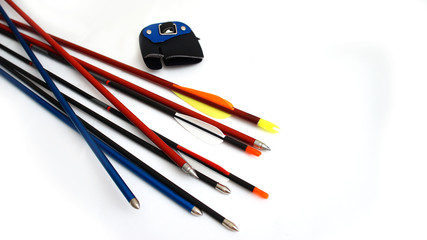 multi-colored srela with silvery tips and plastic plumage, a fingerstall on a white background