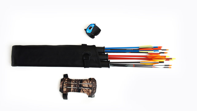 Accessories for archery. Multi-colored arrows with silvery tips in a black quiver, a fingerstall, a gaiter on a white background - Powered by Adobe