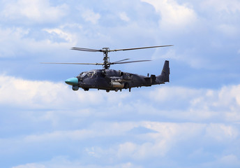 Combat helicopter in flight.