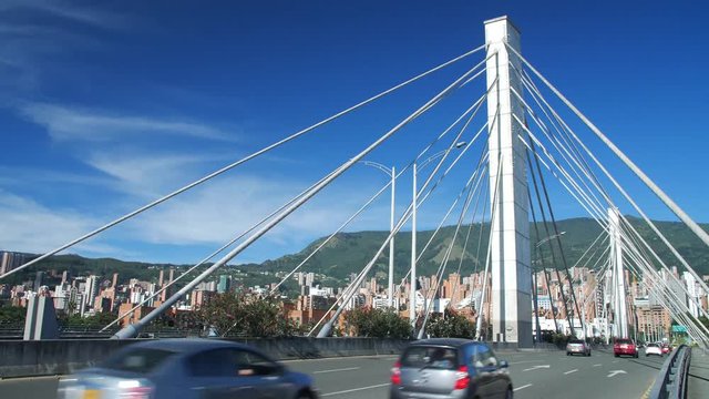 VIEW OF GILBERTO ECHEVERRI 4 SUR - BEAUTIFUL HIGHWAY CITY TRAFFIC BRIDGE MEDELLIN COLOMBIA