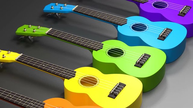 Colorful wooden ukuleles. Rainbow series of traditional hawaiian music instrument. 3D rendering. 4K UltraHD motion graphic animation.