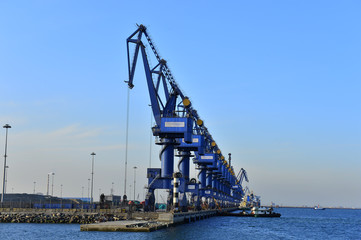 Fototapeta premium Port crane bridge and bulk carrier