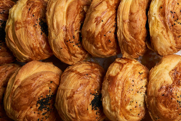 Close-up of a Azerbaijan traditional pastry gogal on rustic wooden table, novruz holiday                              