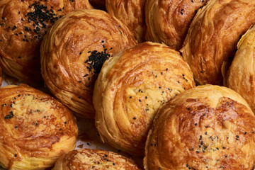 Close-up of a Azerbaijan traditional pastry gogal on rustic wooden table, novruz holiday                              
