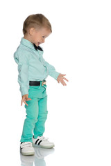 The little boy is emotionally waving his arms.