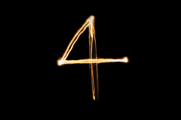 Orange light painting four number on black background