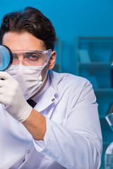 Chemistry assistant working in the chemical lab