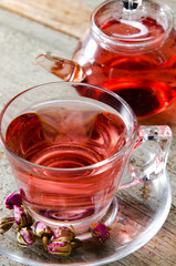 Fruit berry tea in the cup served on table