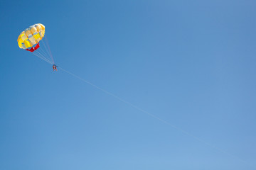 Couple Parasailing, in the Caribbean 
