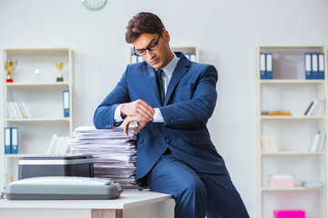 Businessman making copies in copying machine