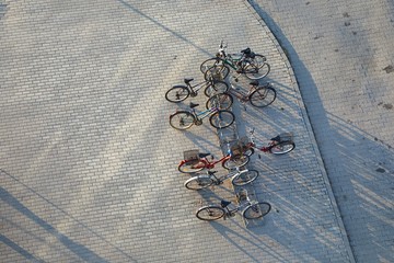 Bicycles stand on a street