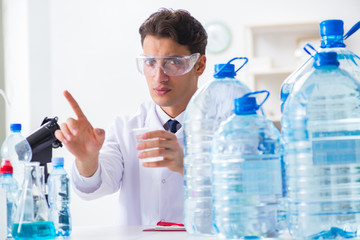 Fototapeta premium Lab assistant testing water quality