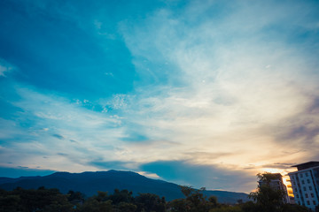   blue sky and mountain in background.