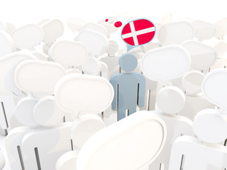 Obraz premium Man with flag of denmark in a crowd