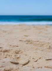 Close up of sand on the beach on a sunny summer day