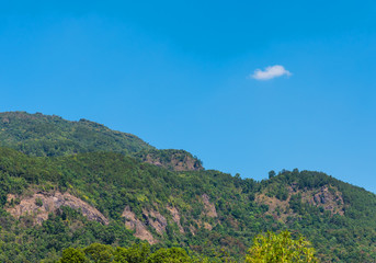 Fototapeta na wymiar mountain and blue sky in background