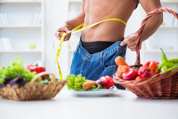 Young man in healthy eating and dieting concept
