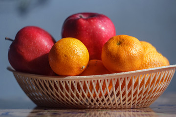 apples orange tangerines fruit basket