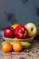 apples orange tangerines fruit basket