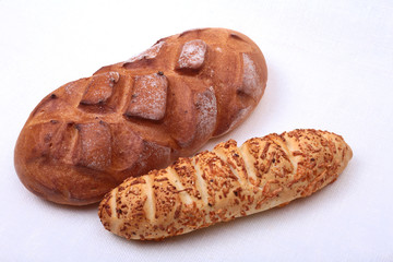 Assorted Fresh homemade bread on white background. Selective focus