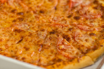 Fresh hot pizza with lots of cheese. Junk food